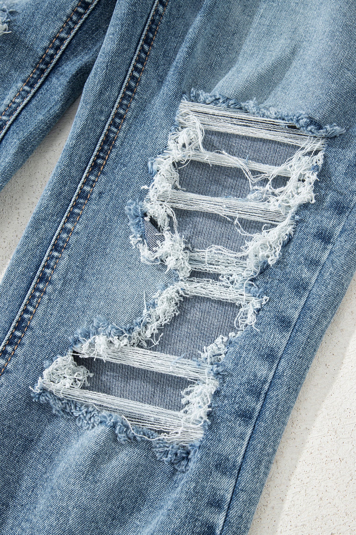 Myosotis Raw Hem Ripped Flare Jeans