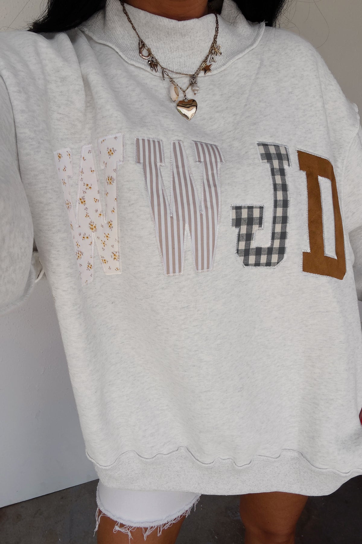 WWJD Embroidered Mock Neck Sweatshirt