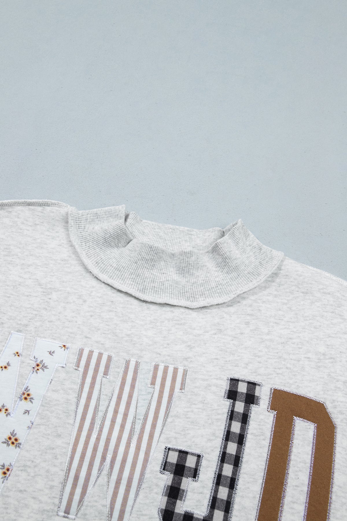 WWJD Embroidered Mock Neck Sweatshirt