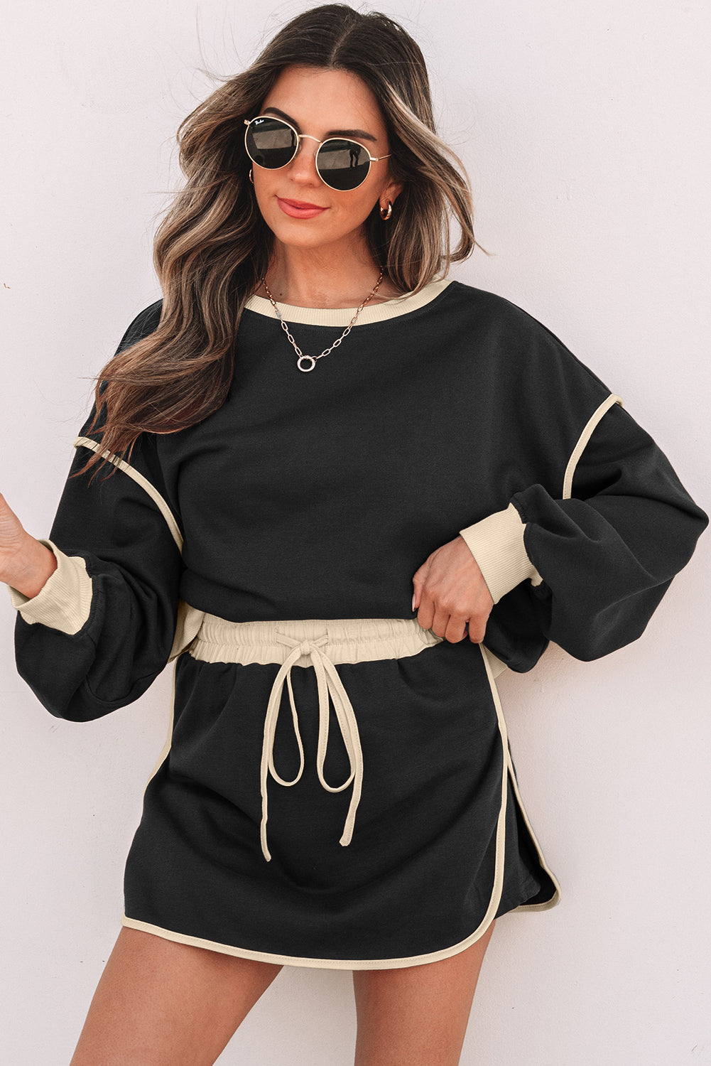 Loose Pullover and Lace-up Waist Skort Set