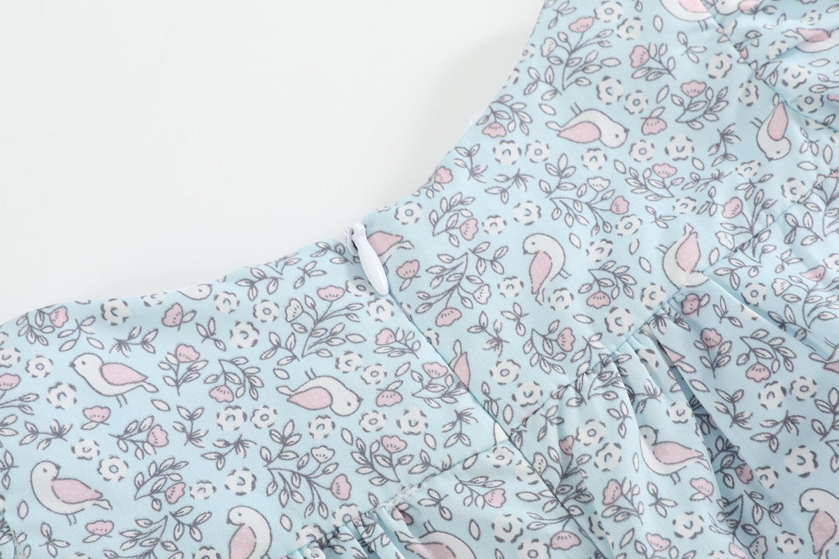 Floral Dove Smocked Flutter Dress